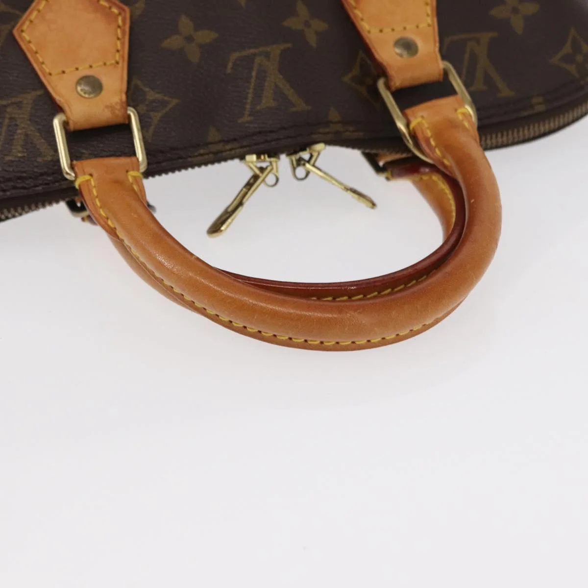 Louis Vuitton Alma Handbag Monogram Canvas - Image 8